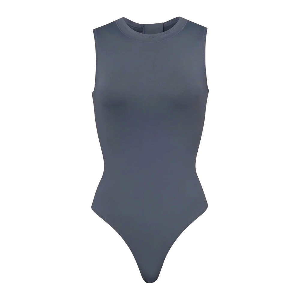 A sleeveless one piece swimsuit with a back zipper and branded zipper pull.